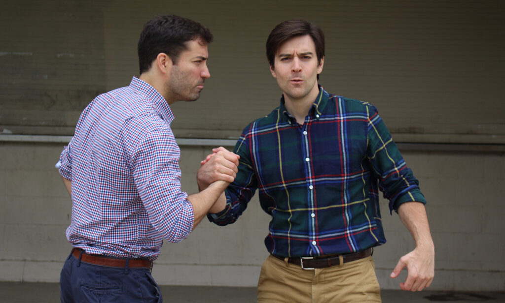 Andy Knauer and Arthur Pielli in handshake
