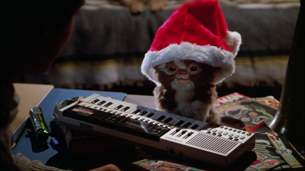 gizmo at a keyboard