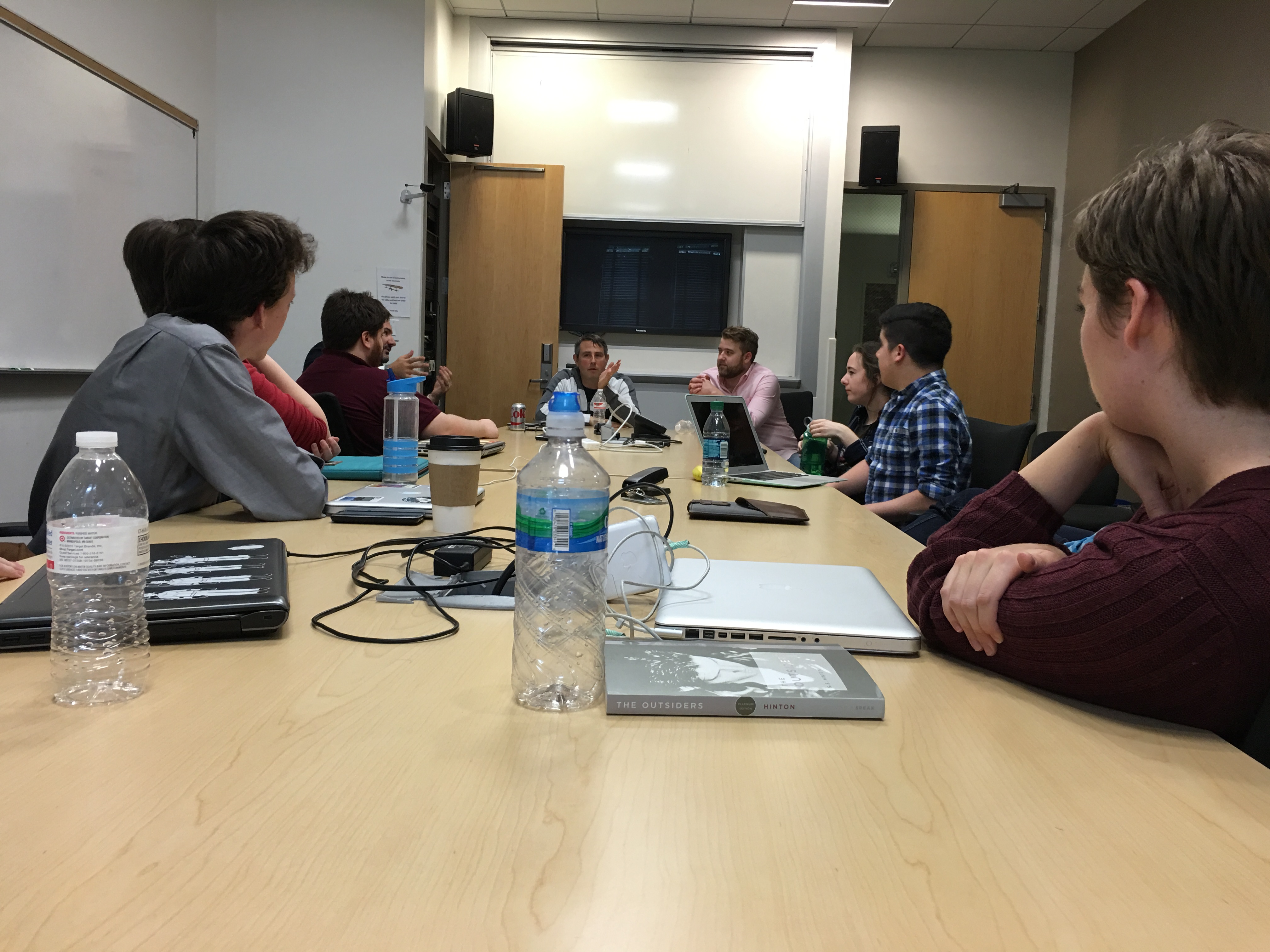 screenwriting students listening to a lecture