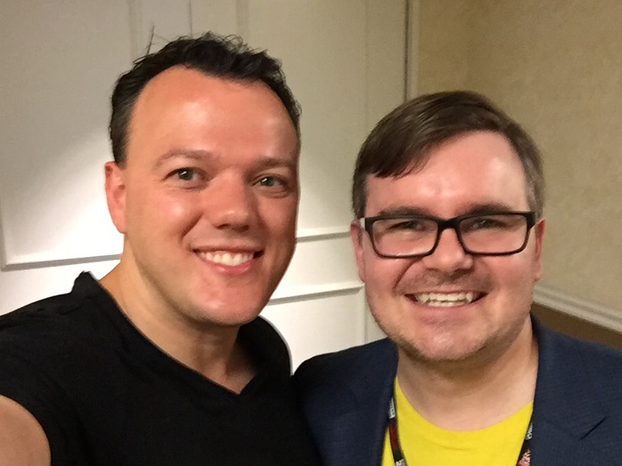 two men smiling
