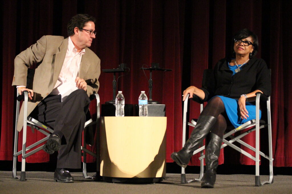 jim fredrick and cheryl on stage