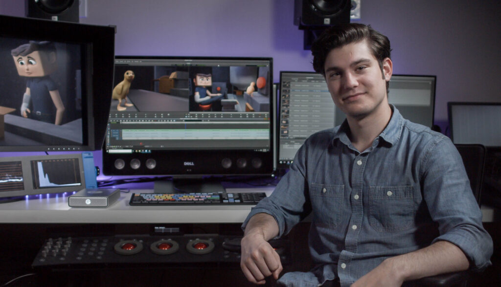 Kyle Harrington '19 pictured with Dell precision 5720 AiO computer