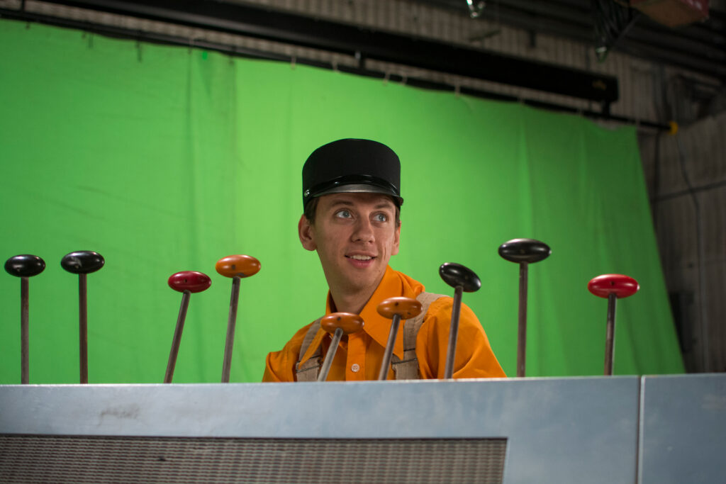Actor on green screen stage