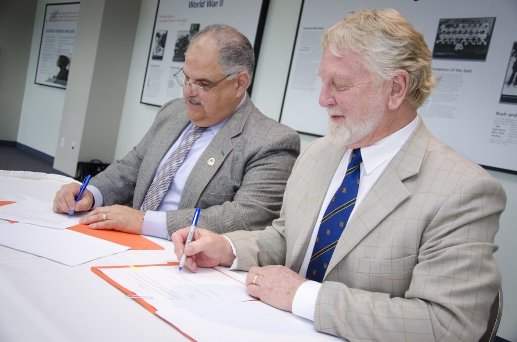 Representatives of CU and WU signing the Memo of Intent to Collaborate in 2008