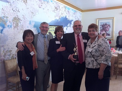 Donald Cardinal, Ph.D., Dean of the College of Educational Studies, receives the “Partner of the Year” award at the Orange County Padres Unidos Partner Appreciation Event on January 22, 2014.