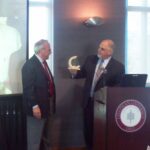 Dean Don Cardinal presenting Dr. Mike Madrid with an award for recognition of outstanding service