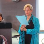 Dr. Gerri McNenny reading limericks to Dr. Mike Madrid