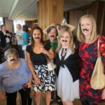 From Left to Right: Maria Lynch, Breann Parker, Kathy Arballo, Laura Burns, and Anna Lane showing their support for Dr. Mike Madrid by wearing his trademark mustache.