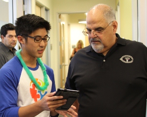 Jared Izumi (left) with Dean Donald Cardinal (right), Ph.D.