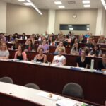Students in auditorium classroom.