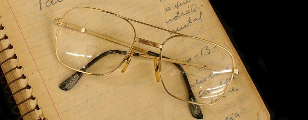 Glasses on papers with Paulo Freire's signature