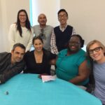 PhD students and faculty member Kris DePedro (Top Right) prepare for an evening of conversation