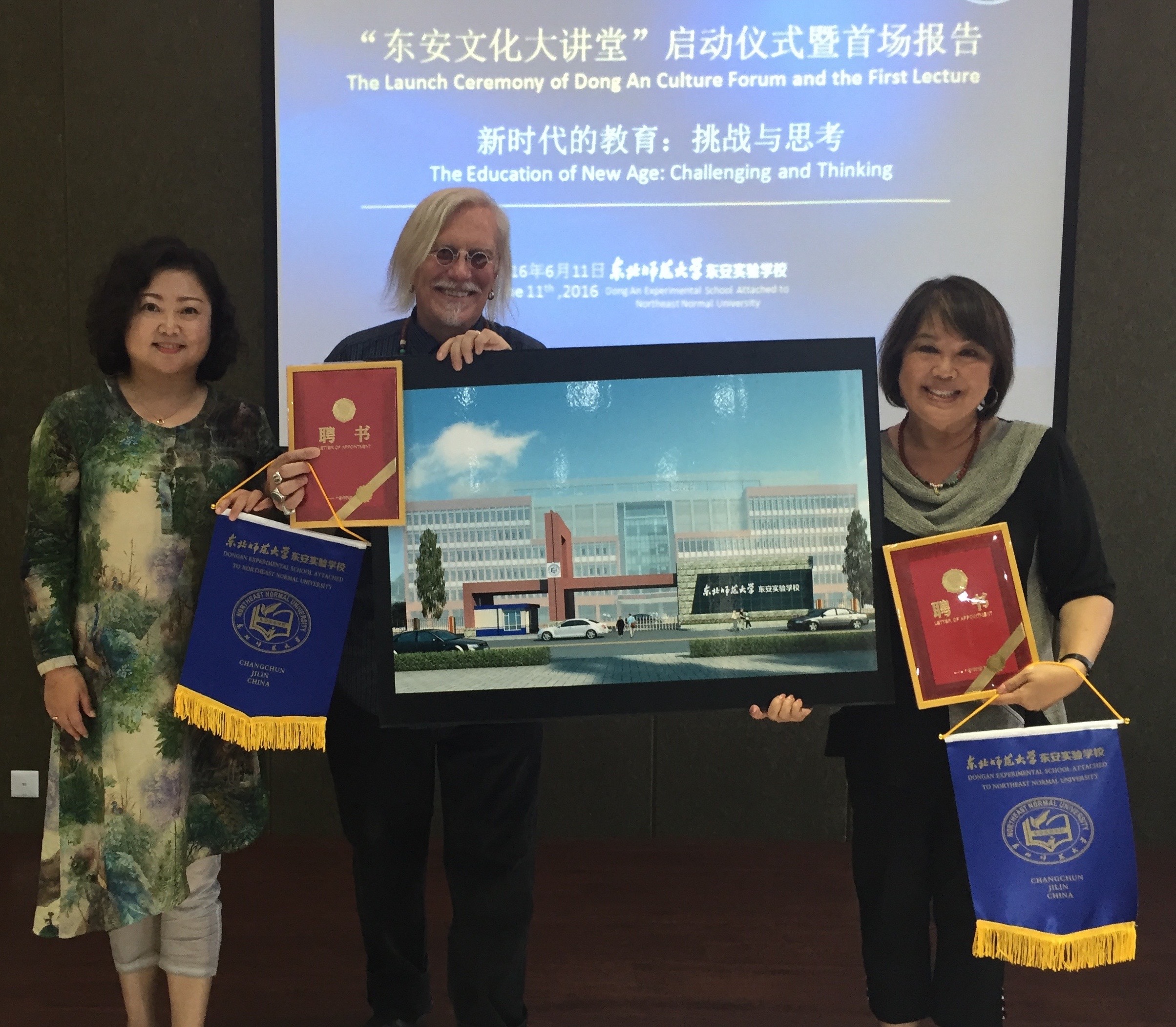 China High School grand opening with Peter and Suzi as International Consultants