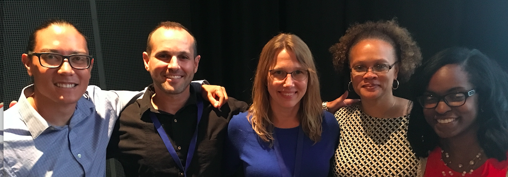 Group of presenters at conference