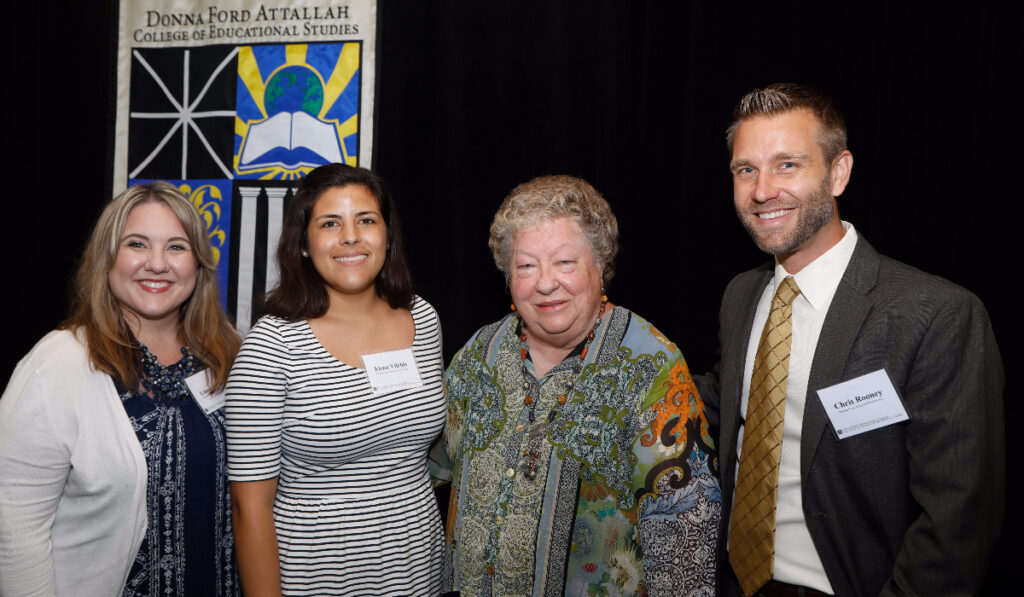 Group of students shown with Donna