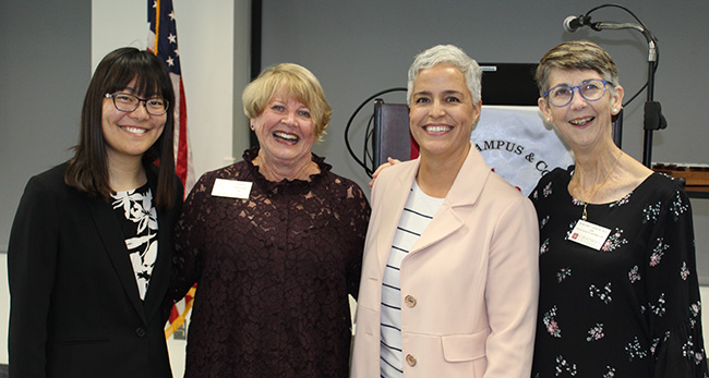 Betty Valencia with fellow speakers at the Chapman Town & Gown