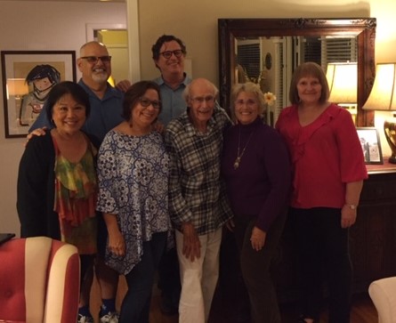 Tom Wilson (center) with Attallah College colleagues meeting in his home