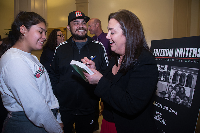 Tony Arteaga with his daughter and Erin Gruwell