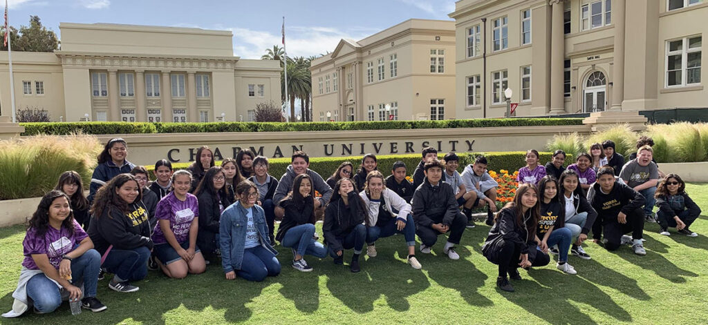 Group picture of Yorba-Chapman Writing Partnership field trip to Chapman in front of Memorial Hall