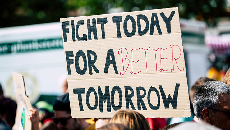 Protest sign saying "Fight today for a better tomorrow?