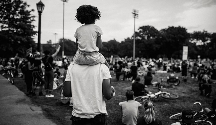 Father and small child in a community park