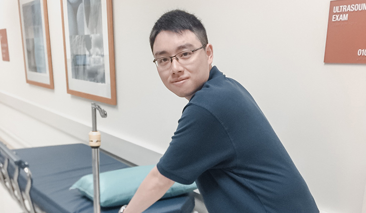 Young man working at CHOC's Project Search, a career training program for individuals with disabilities
