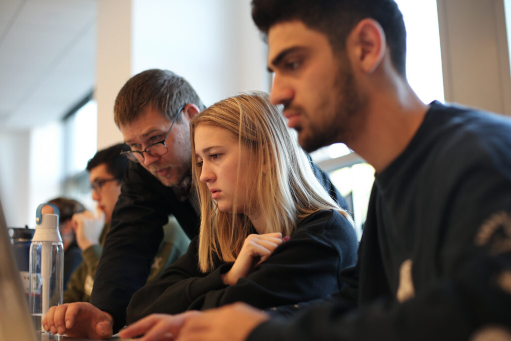 students engaging with professor