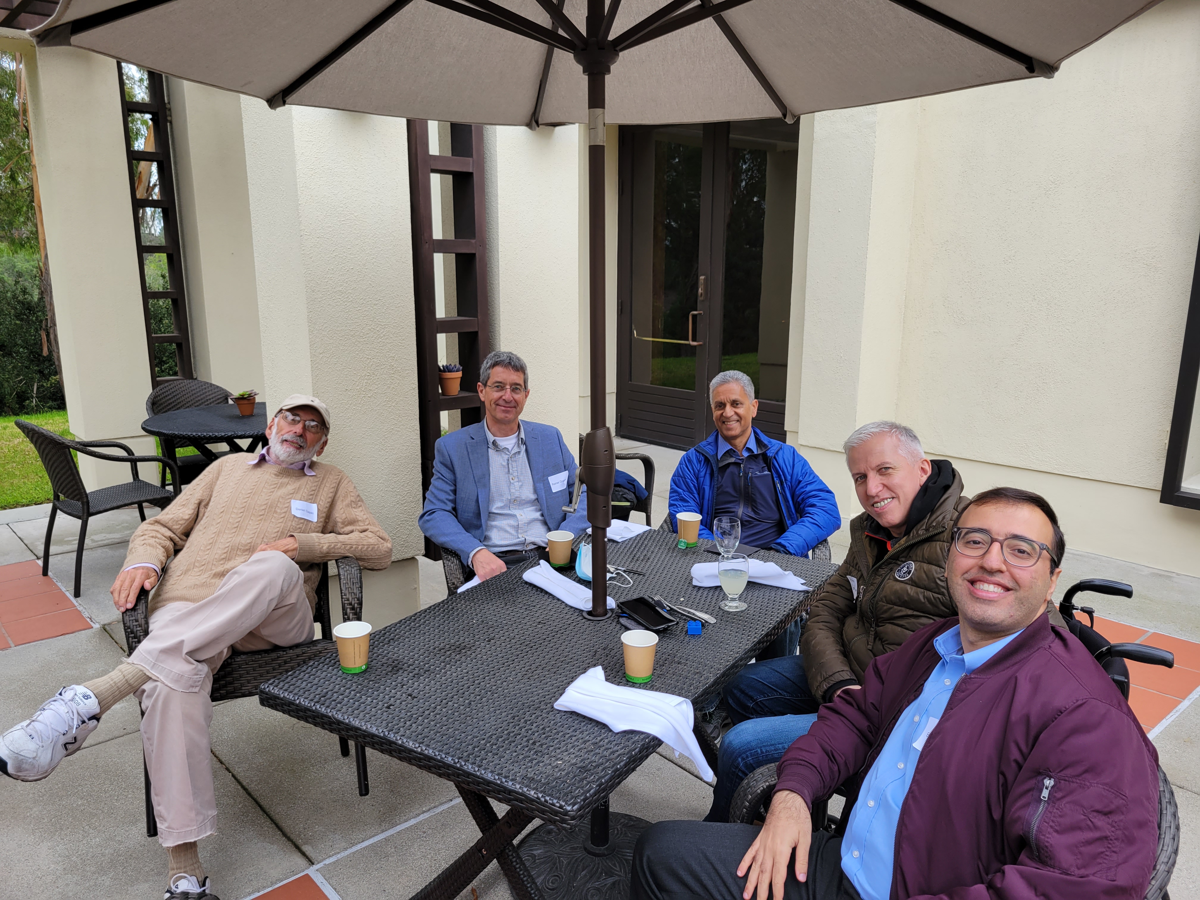 Dr. Arasteh with a group of mentors and colleagues.