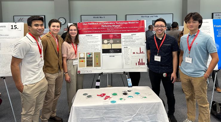 Evelyn Lawrie with other research students at the Fall Scholar Symposium