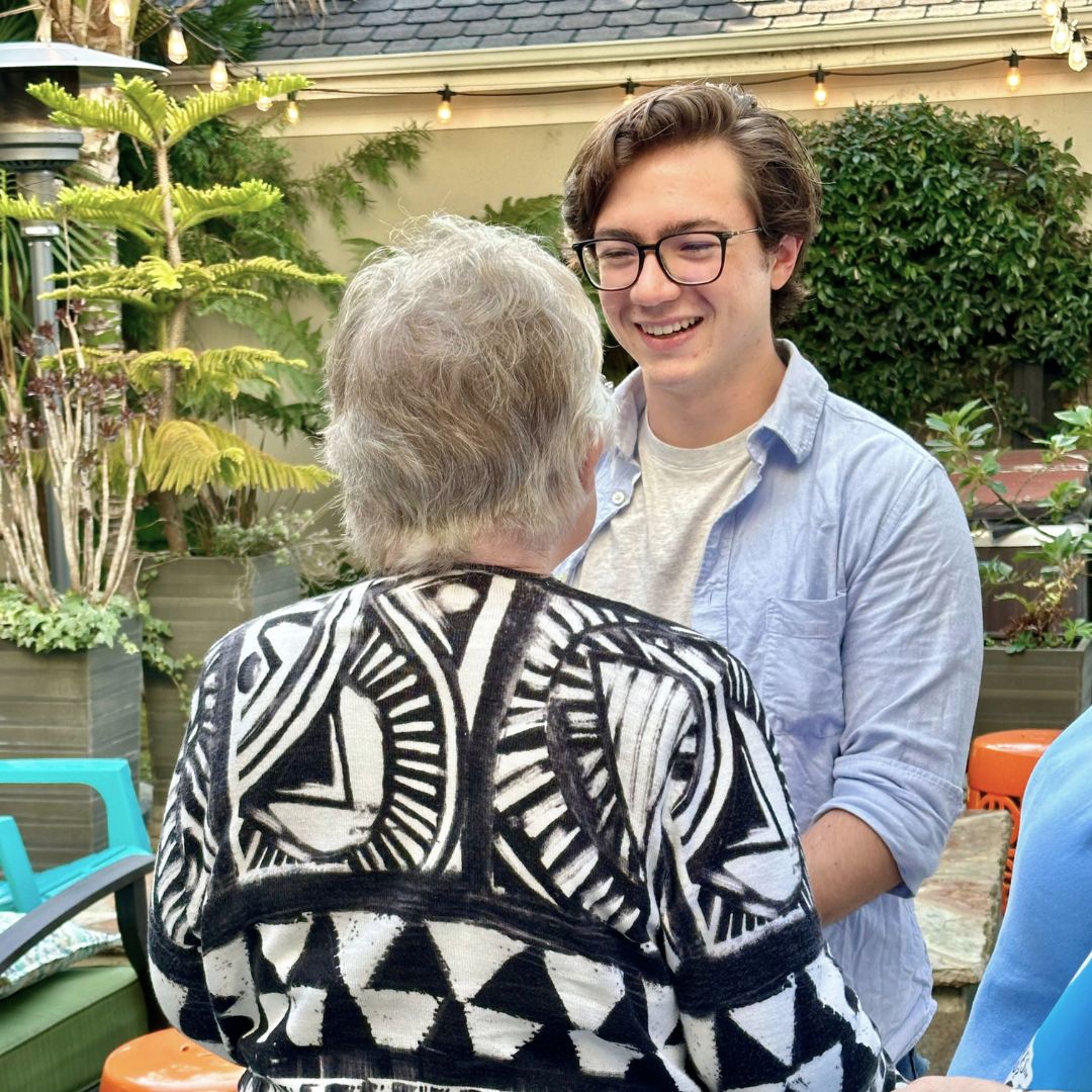 Engineering student Matt Shugarte meeting Susan Swenson. 