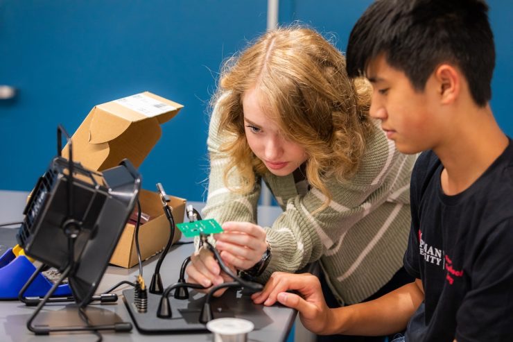 Chloe Leis helps student over the summer.