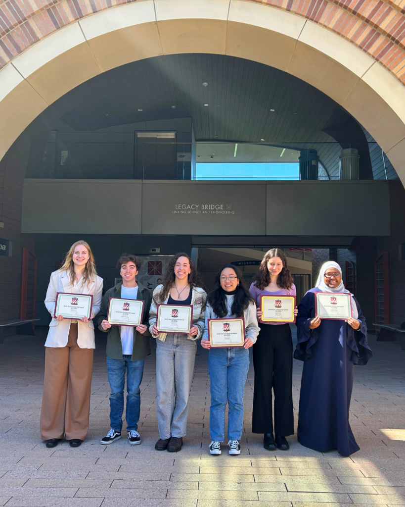 Students showing certificates