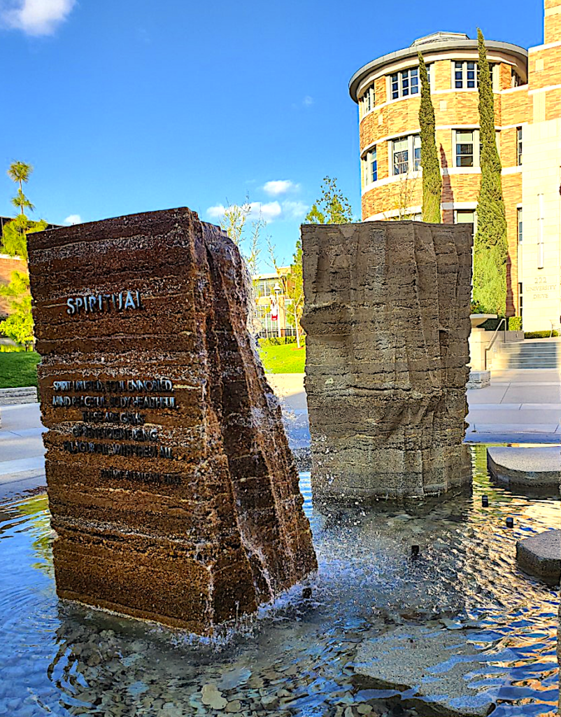 image of stone pillar with the words spiritual on it