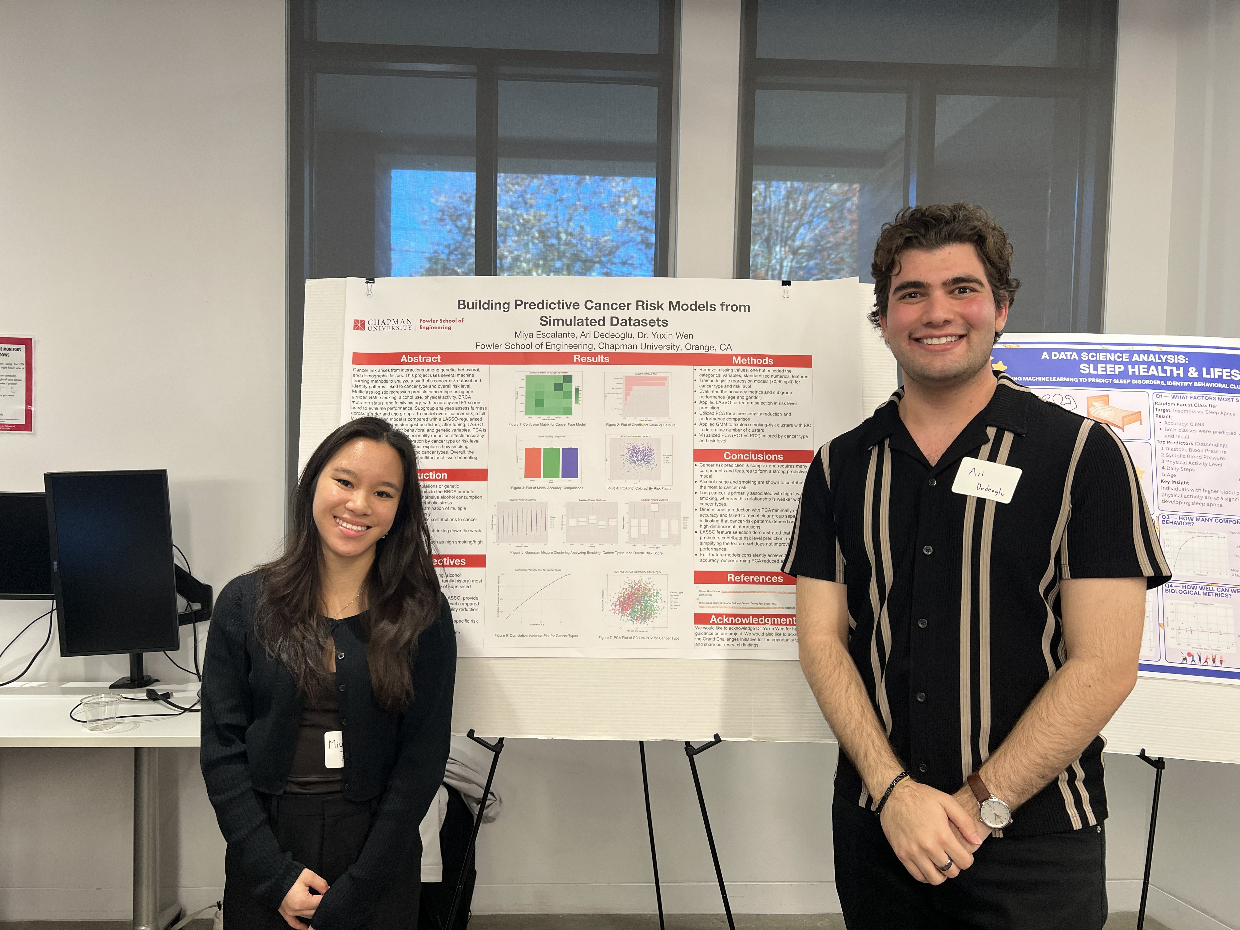 Miya Escalante and Ari Dedeoglu and their research poster on "Building Predictive Cancer Risk Models from Simulated Datasets."