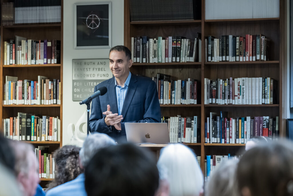 Stefan C. Ionescu speaking to an audience inside the Samueli Holocaust Memorial Library