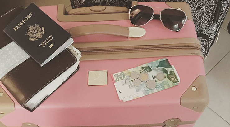 decorative image of suitcase with passport