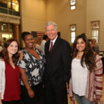group photo of students with professor