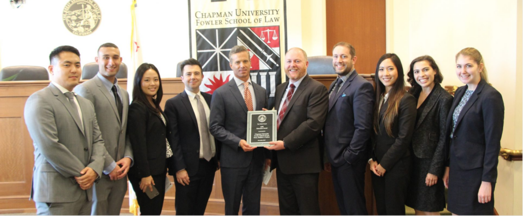 group of people accepting award