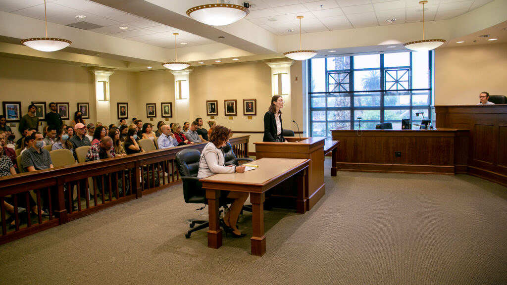 Two law students facing the bench in an appellate courtroom