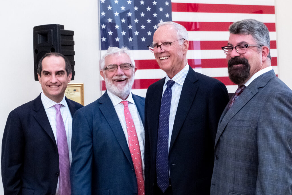 Photo of Dean of Chapman Law, Dean Paul D. Paton, KC (far right); Chair of Chapman’s Board of Trustees Parker S. Kennedy; Chapman President Daniele C. Struppa (left)