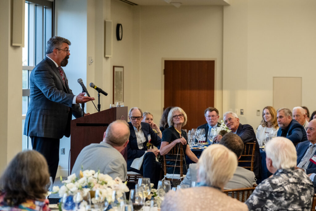 Photo of Dean of Chapman Law Dean Paul D. Paton, KC presenting remarks to the audience