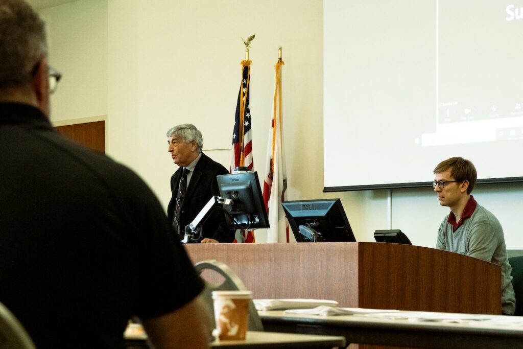 Photograph of Professor Mainero, Professor John Bishop, and Dean Paul Paton during a Bar Preparation session