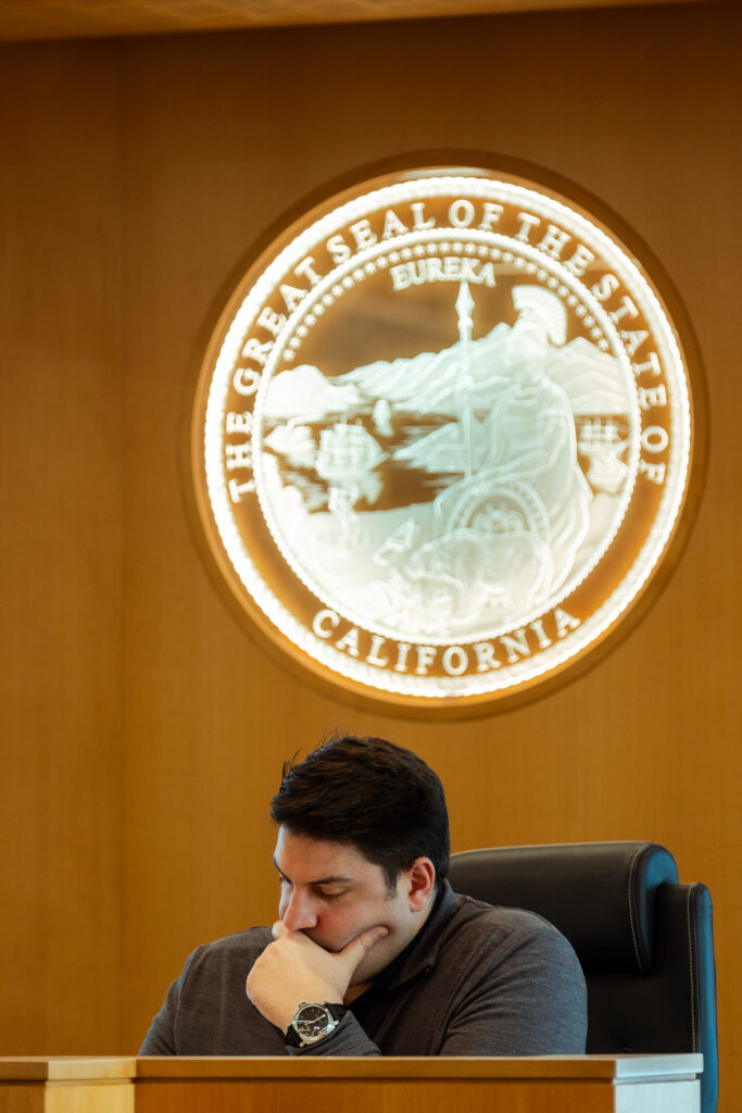 Photograph of a judge, deliberating