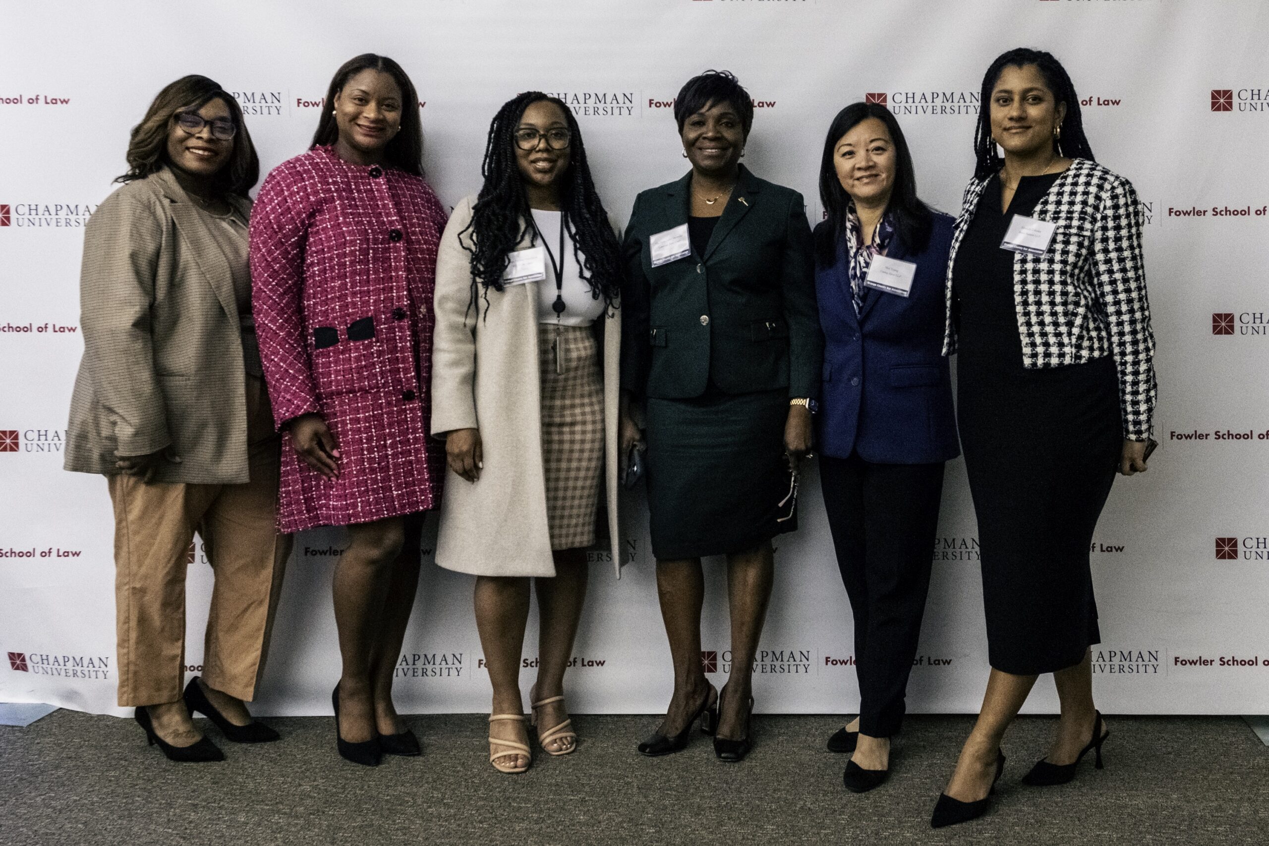 Photograph (from left) of Rebekah F. Thomas, Esq., Melonie S. Jordan, Esq., Hon. Desirae Hutchinson, Hon. Juliet O. Macaulay, Mei Tsang, Esq., and Honieh Udenka, Esq.