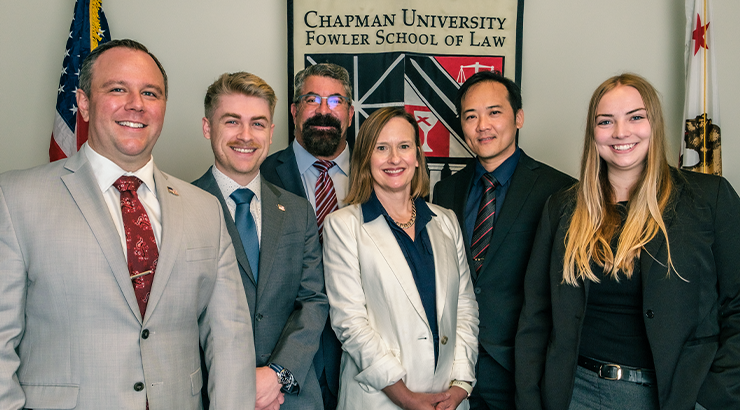 Photo of Fowler School of Law Deans and graduating students who are joining the JAG Corps after graduation.