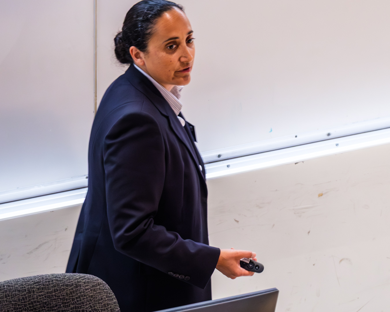 Photo of a professor giving a mock law lecture to parents and partners