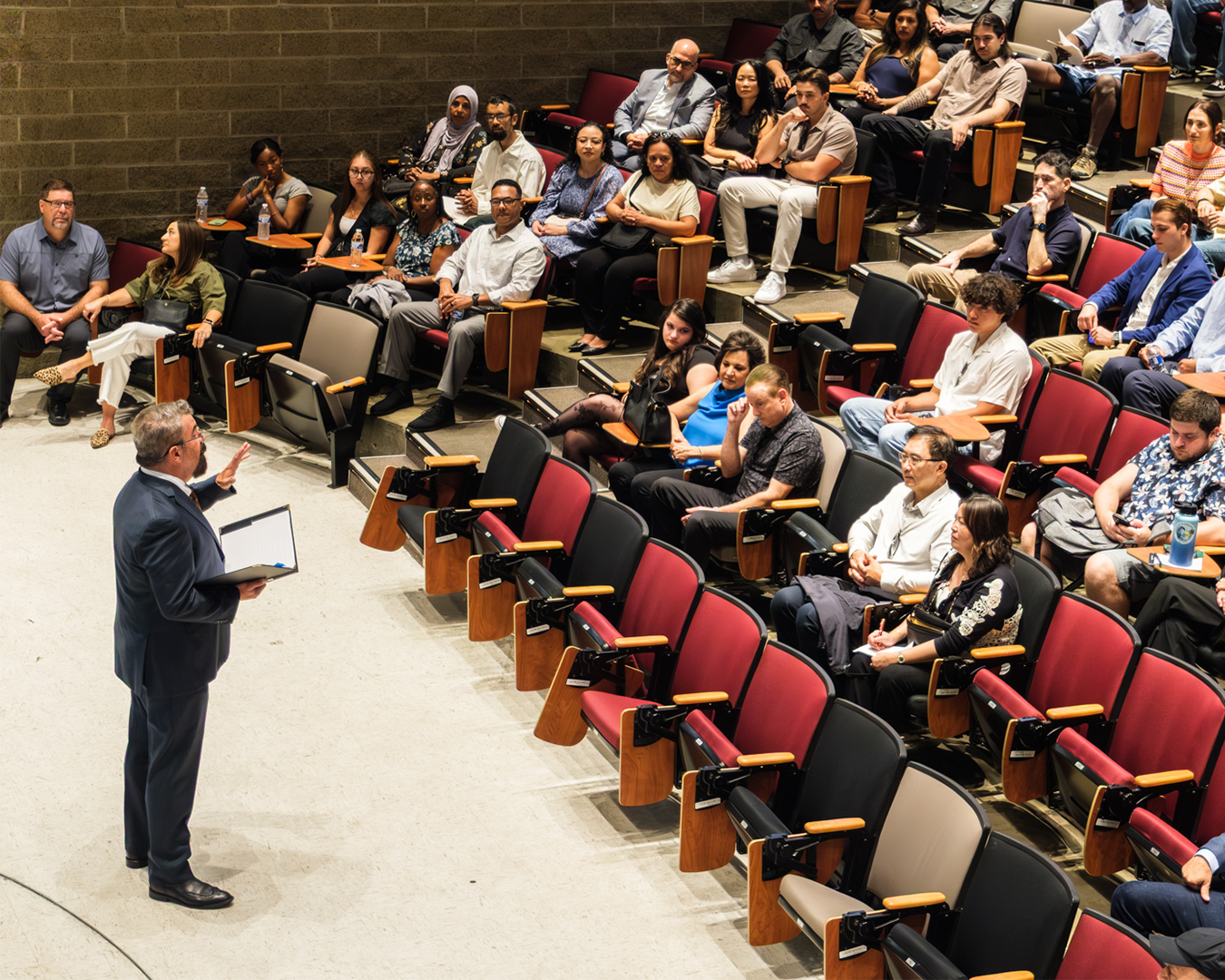 Photo of Dean Paton addressing parents and partners