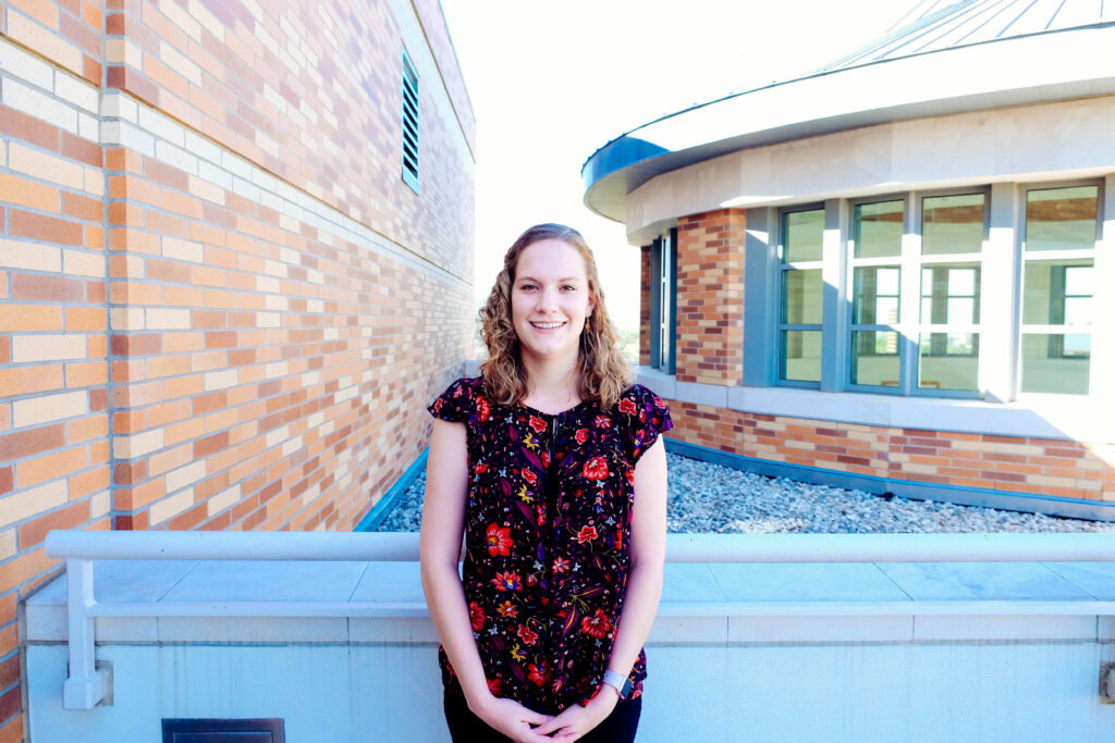 Lauren Dubell poses on the 4th floor terrace of the Leatherby Libraries