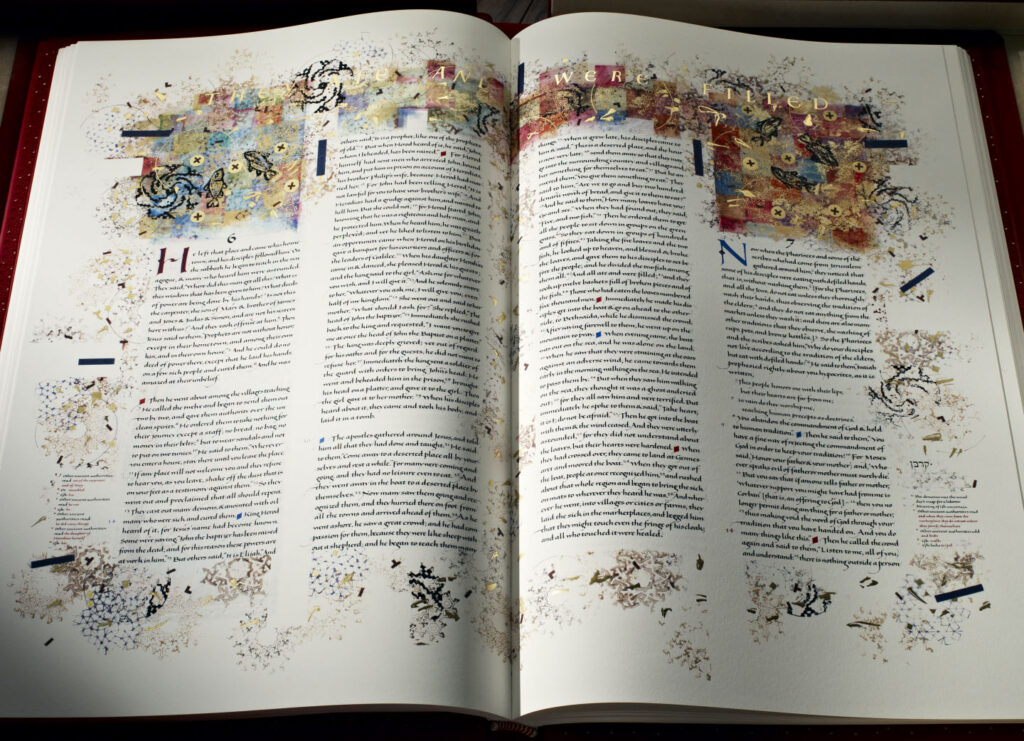 Bible open to illuminated page