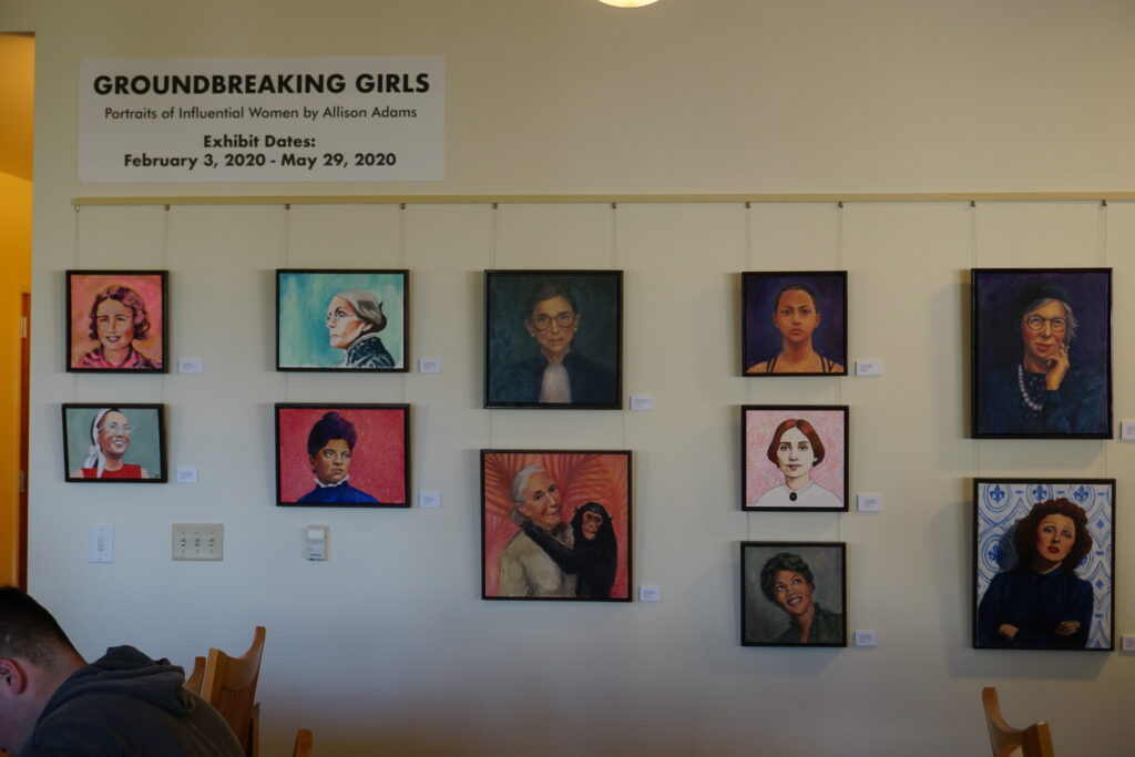 Framed portraits hanging on a wall